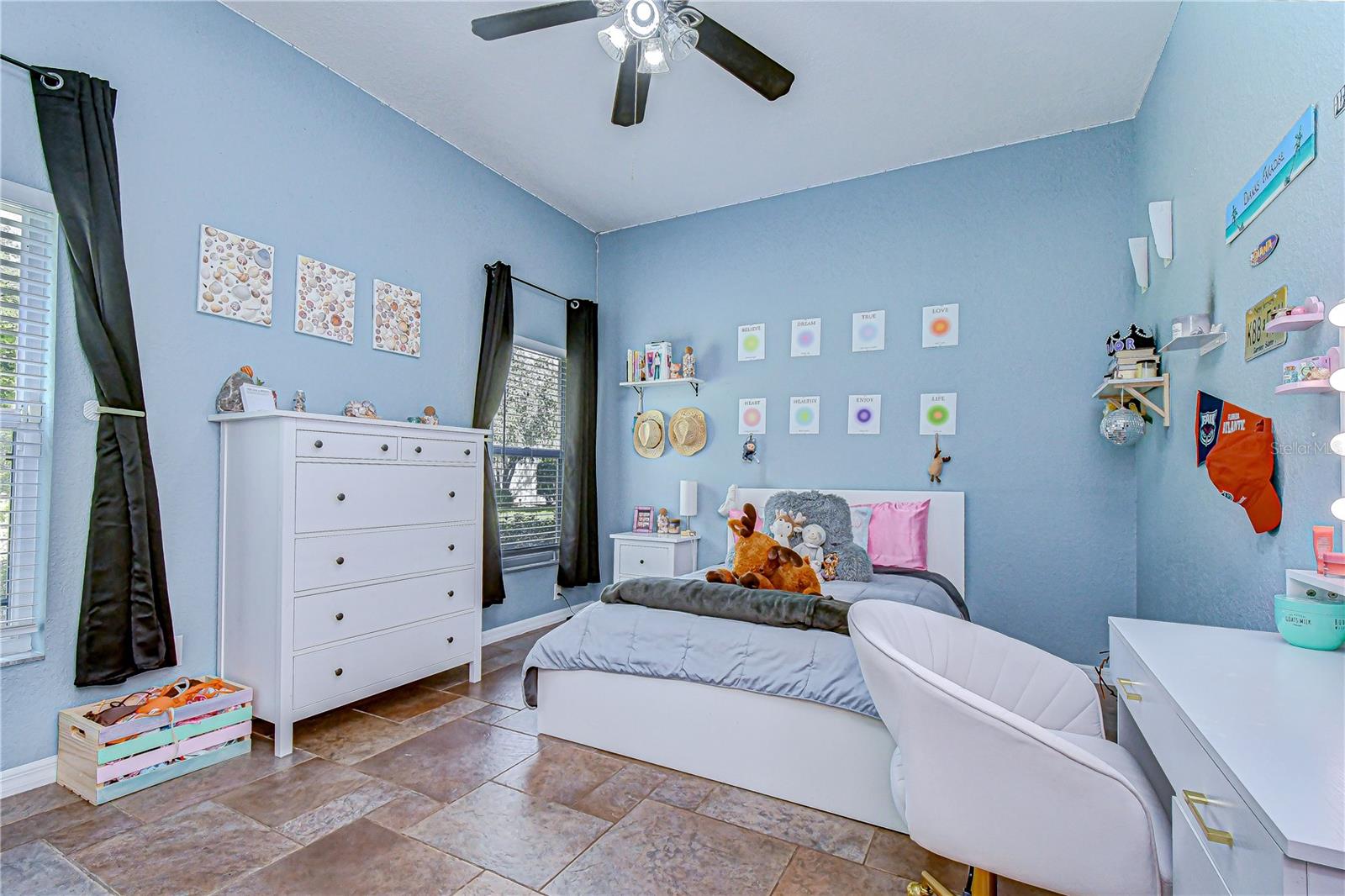 Generously sized secondary bedroom with natural light