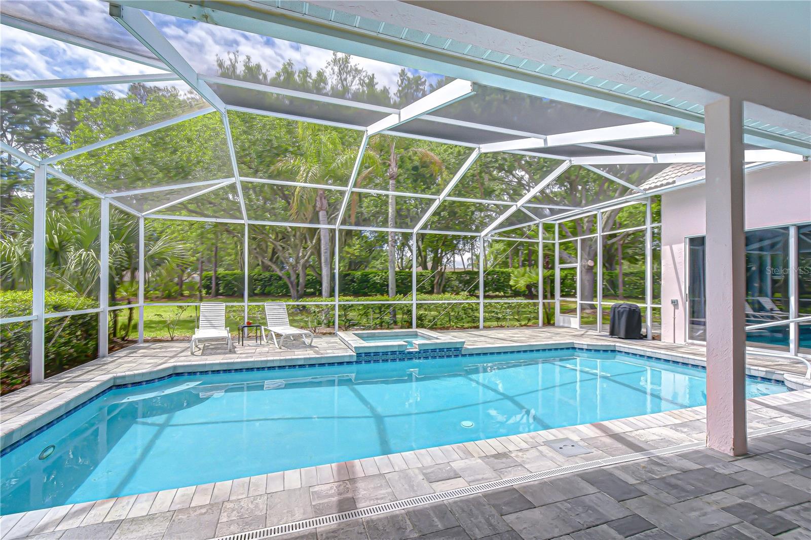 Sparkling pool creating a private backyard oasis