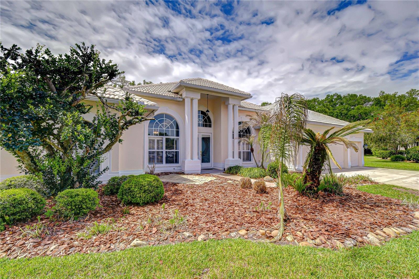 Impressive front view highlighting the home’s scale and presence