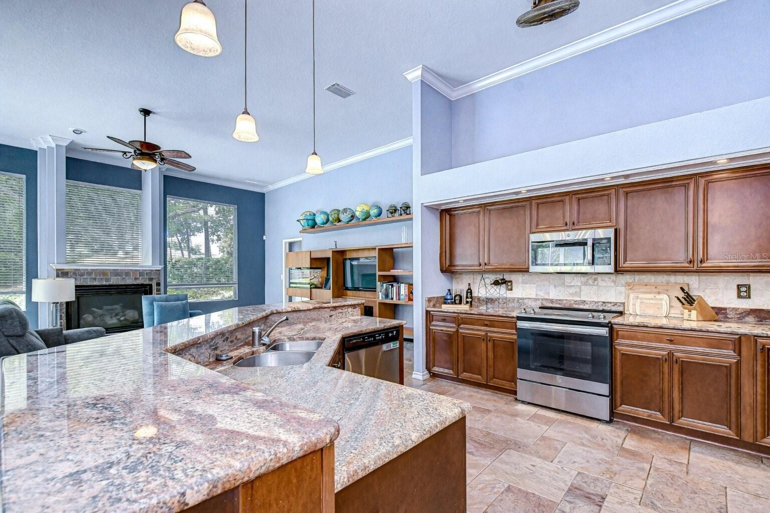 Granite countertops and rich wood cabinetry