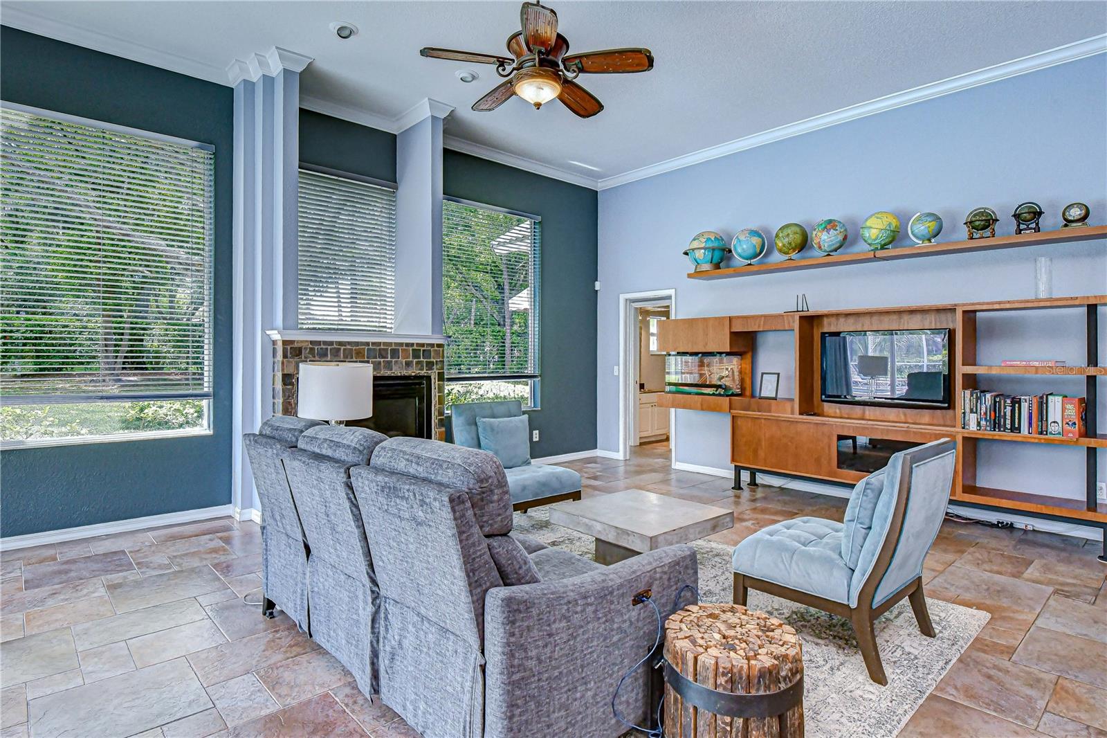 Walls of windows fill the space with natural light