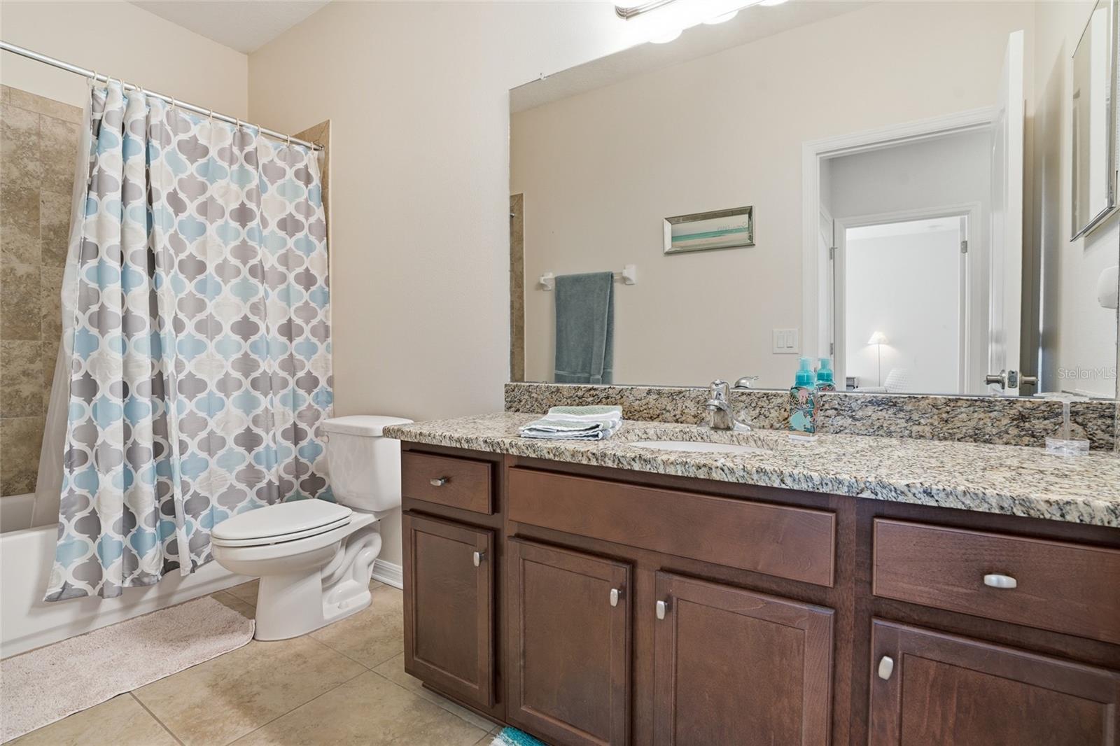one of 2 upstairs bathrooms