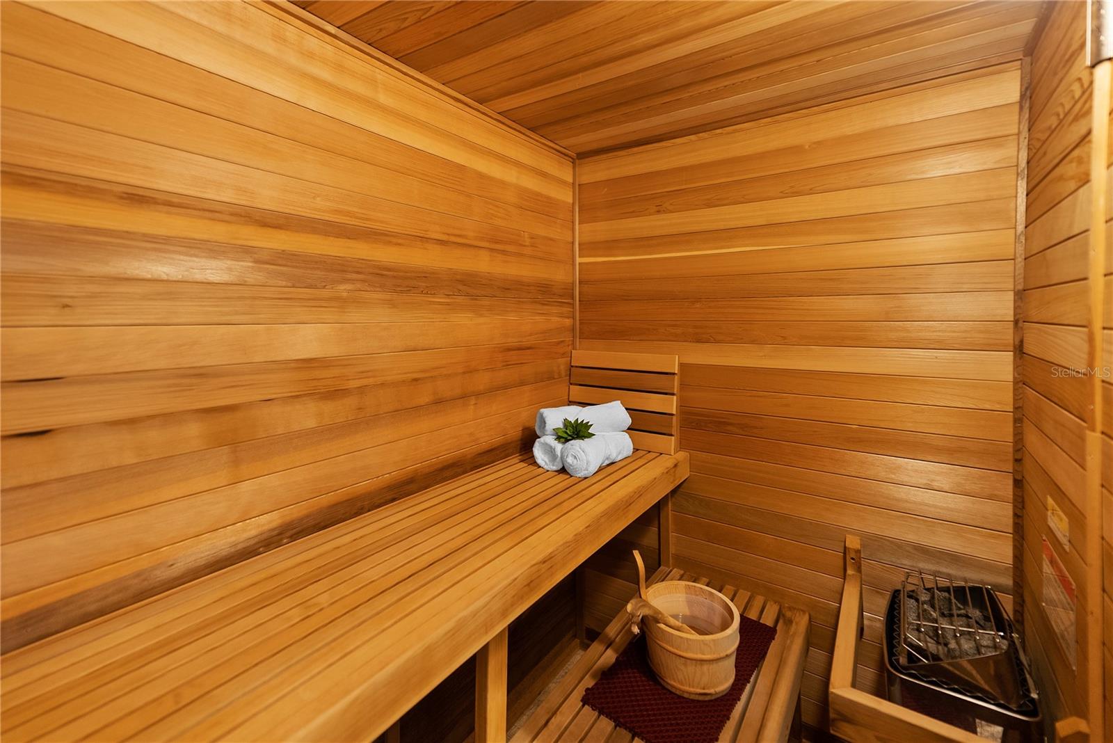 Expansive cedar sauna in the primary suite, designed for a true at-home wellness experience.