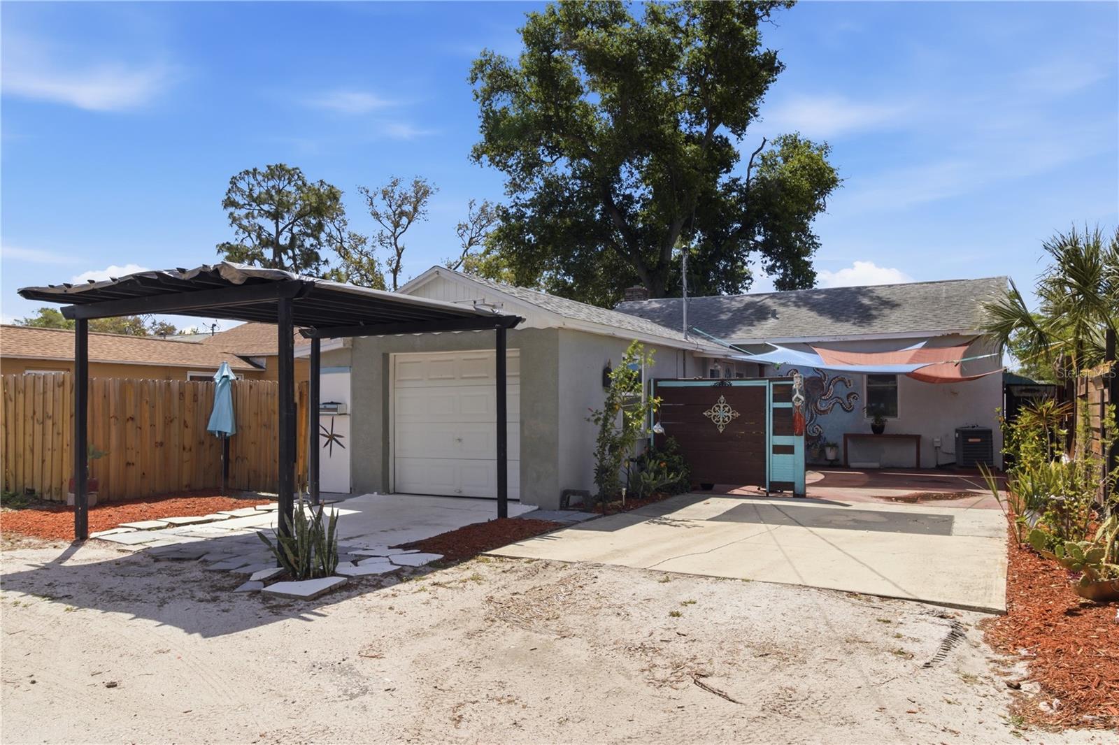 Attached Garage & Extended Carport