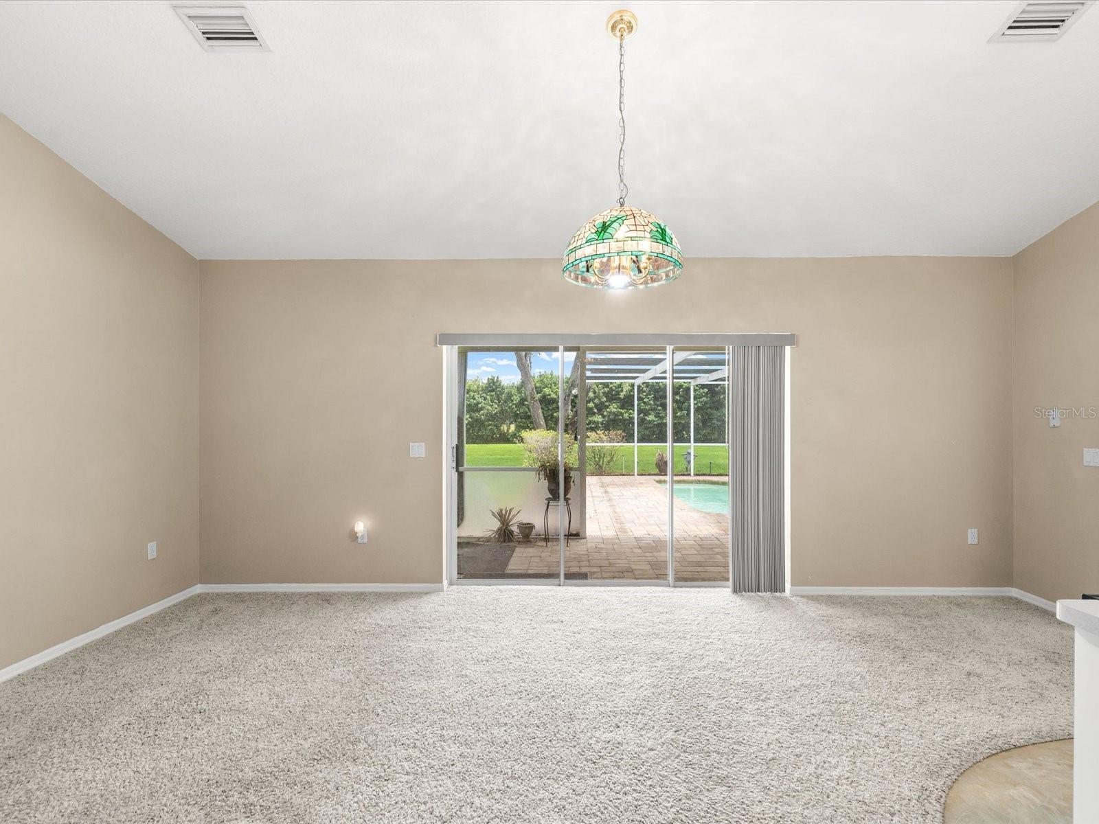 In-law suite living with sliders to pool