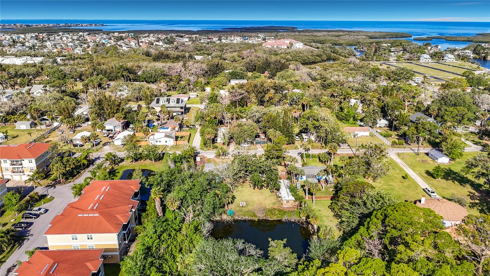 Quiet pond views,  sunrises and fishing out back; Gulf sunsets out front!