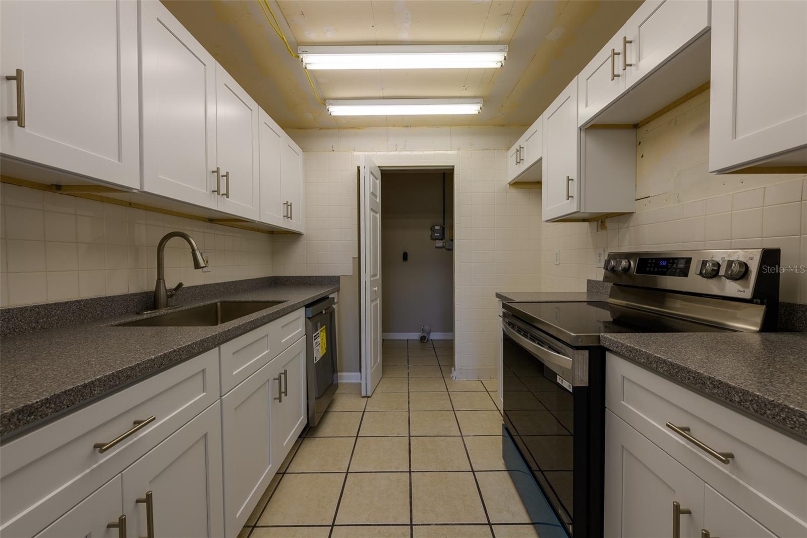 Kitchen, new refrigerator added after photos.
