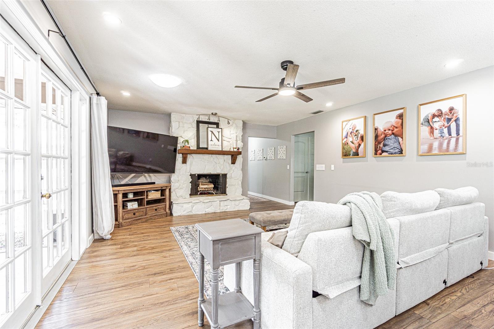 Family Room with wood burning fireplace.