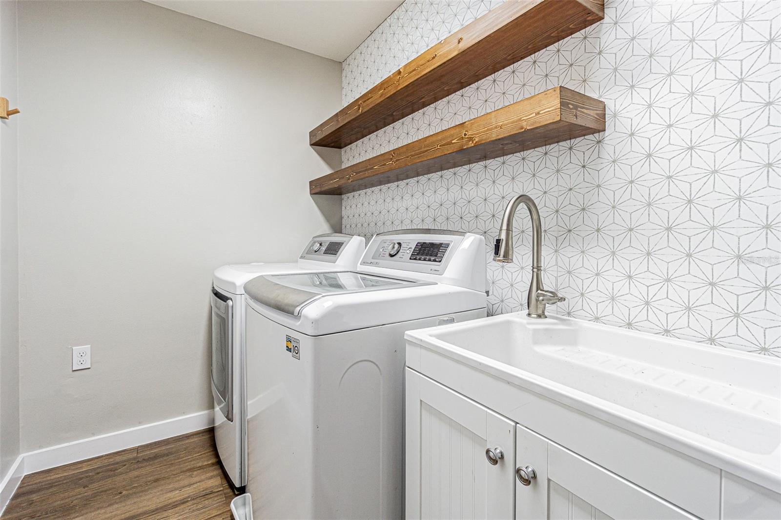 Laundry Room with custom shelving.