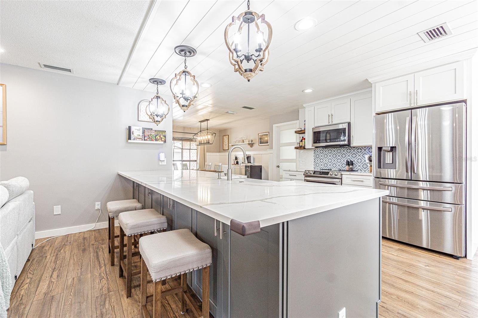 Custom Kitchen with large breakfast bar.