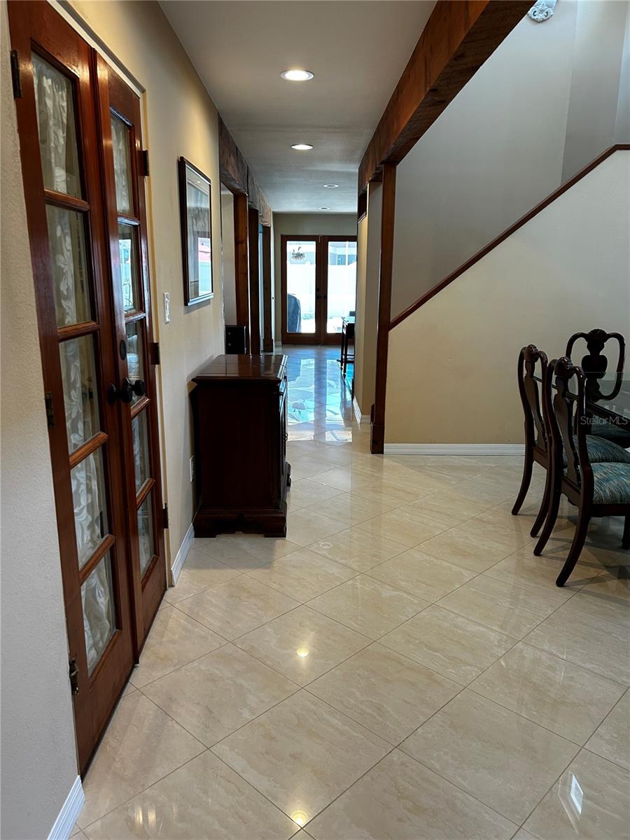 Hallway from formal living room to family room