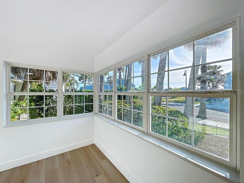 PRIMARY BEDROOM WITH WATER VIEW