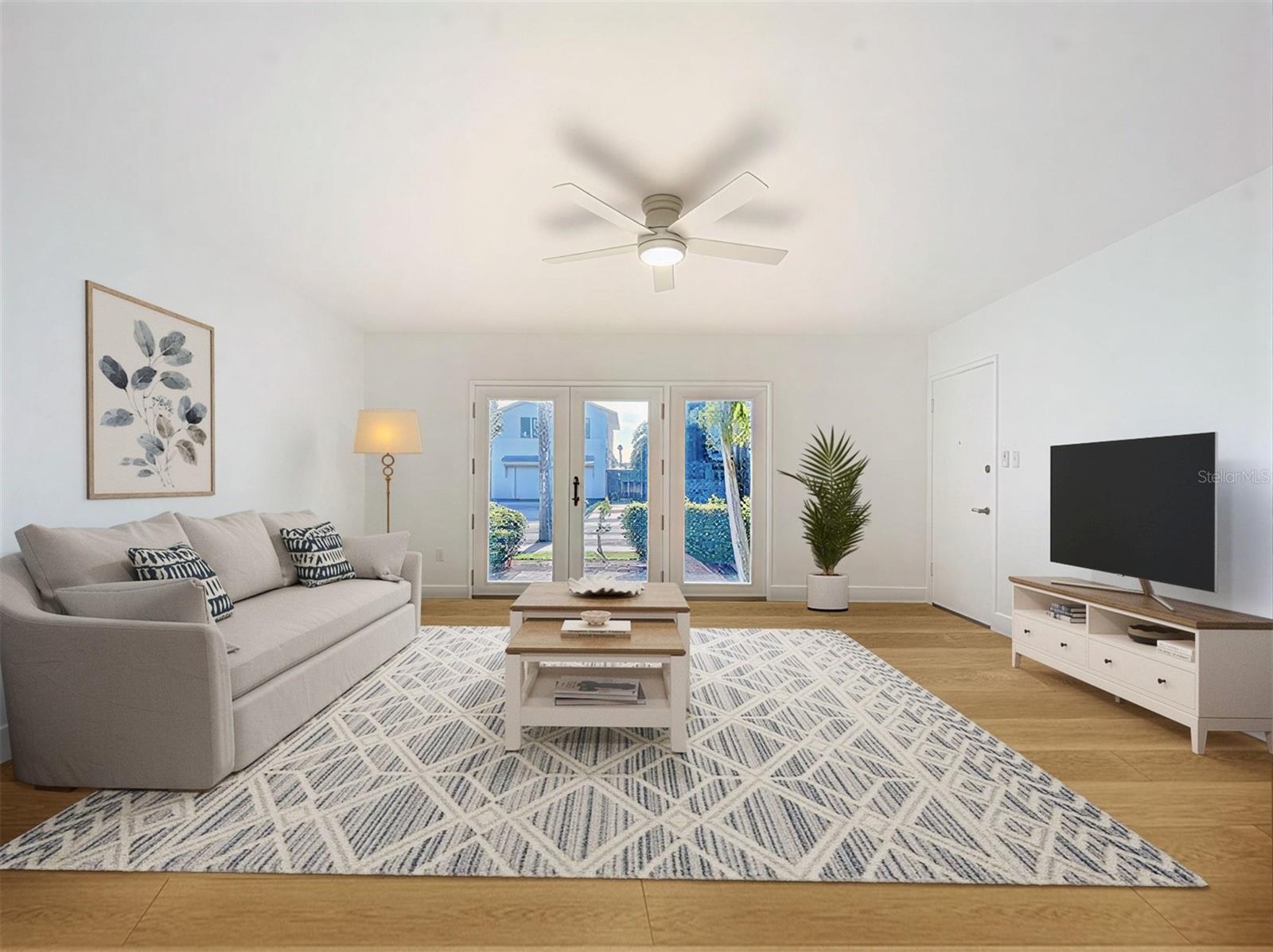 LIVING ROOM WITH WATER VIEW