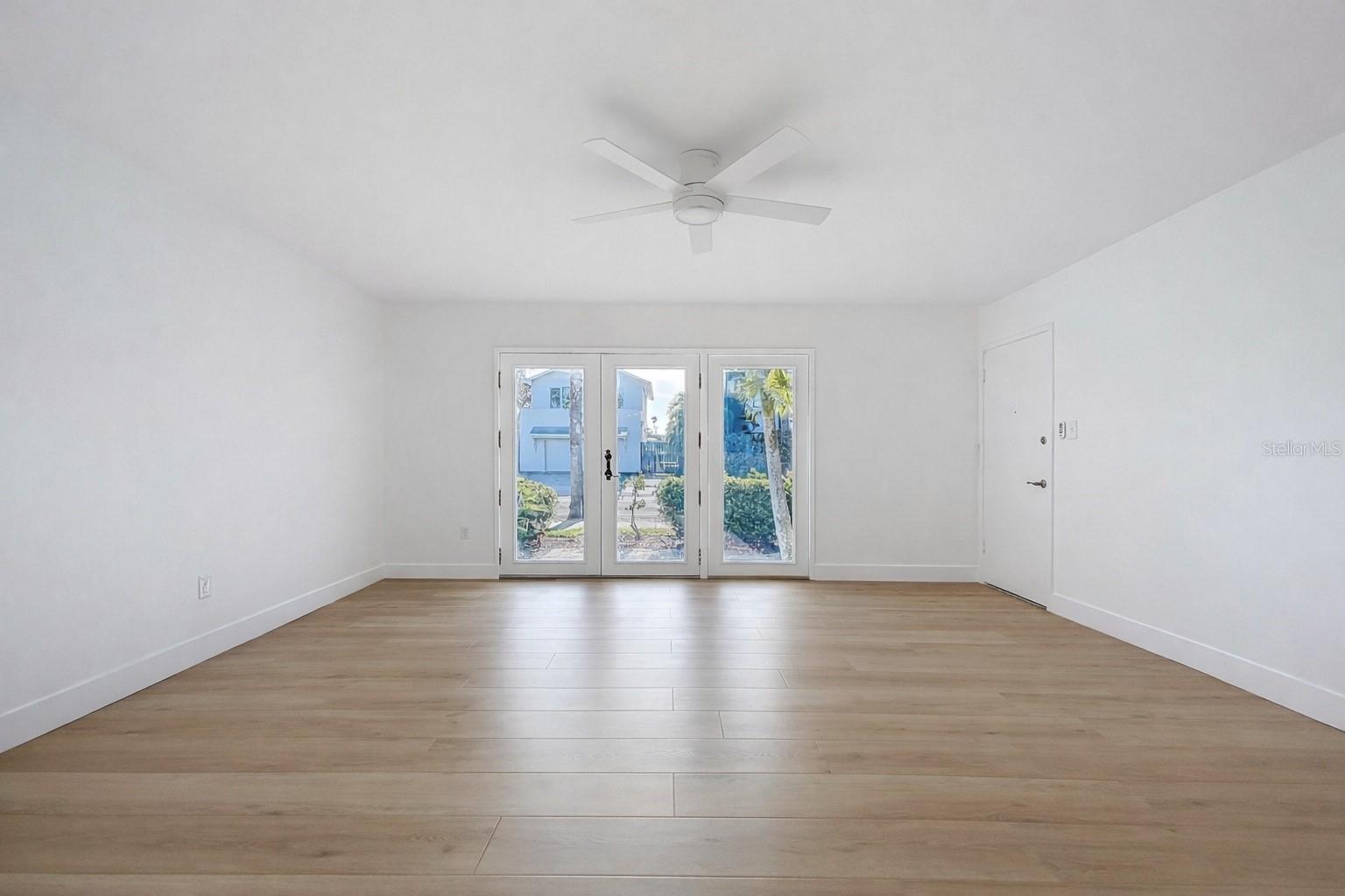 LIVING ROOM WITH WATER VIEW