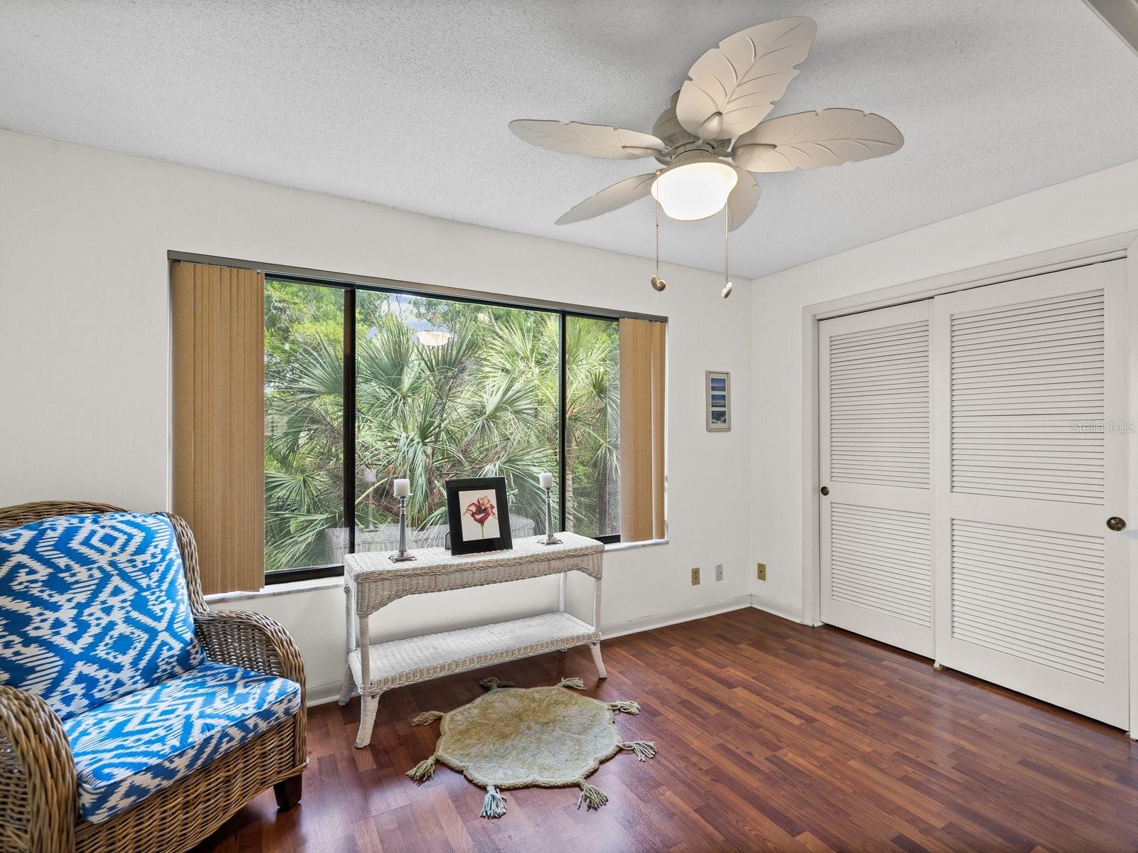 Bonus room with large window overlooking trees