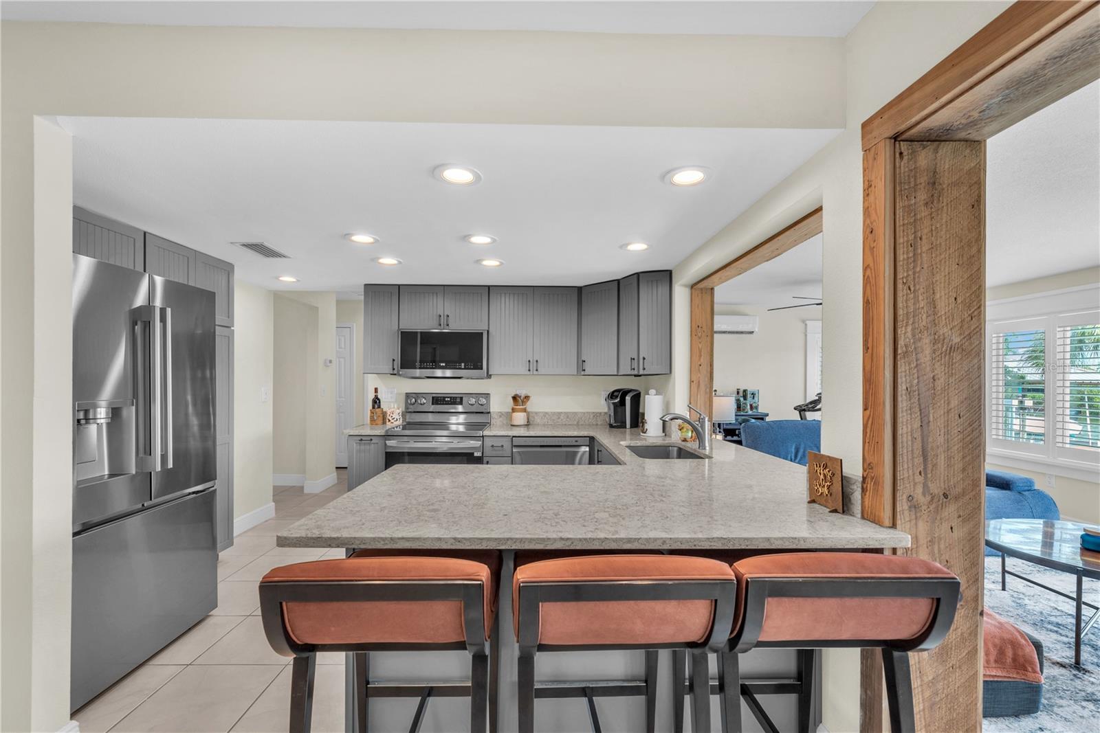 Kitchen with eat in bar top