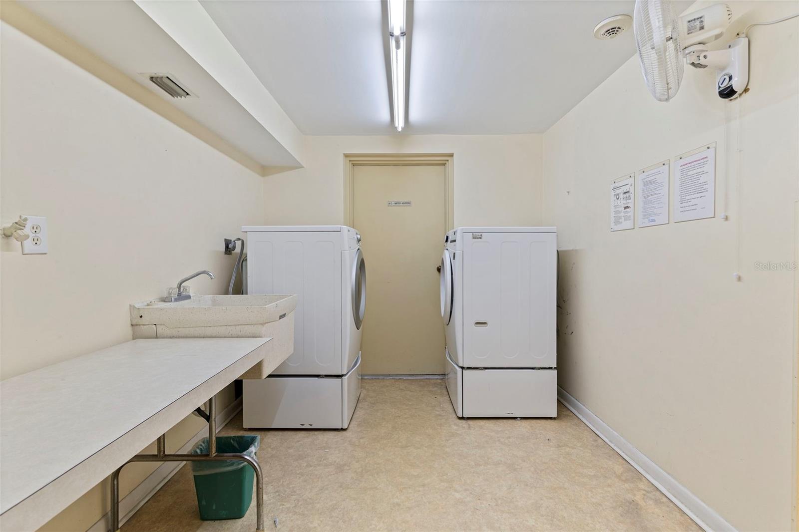 Laundry room located right outside of unit
