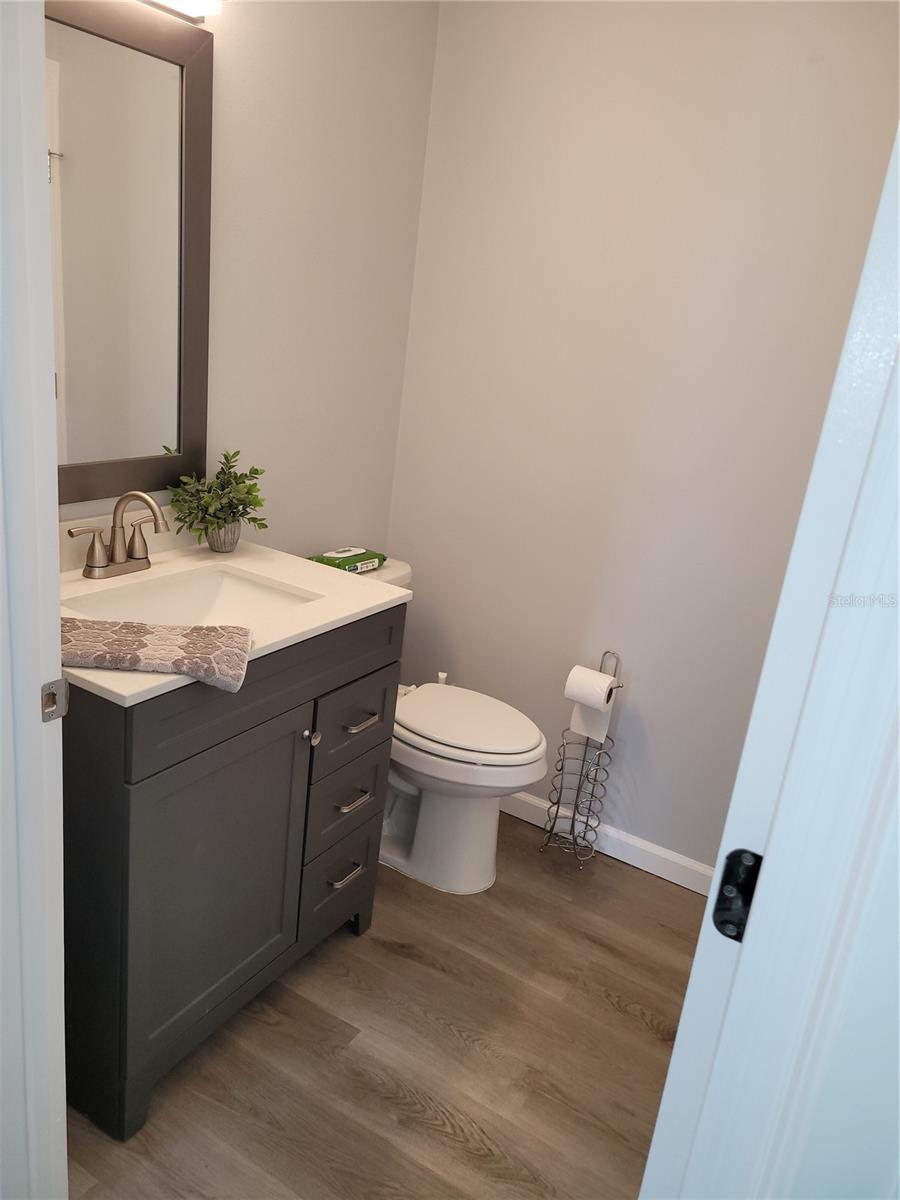 Guest bathroom, "Jack and Jill" has its own sink. Access is from the living room and also from the Primary Suite.