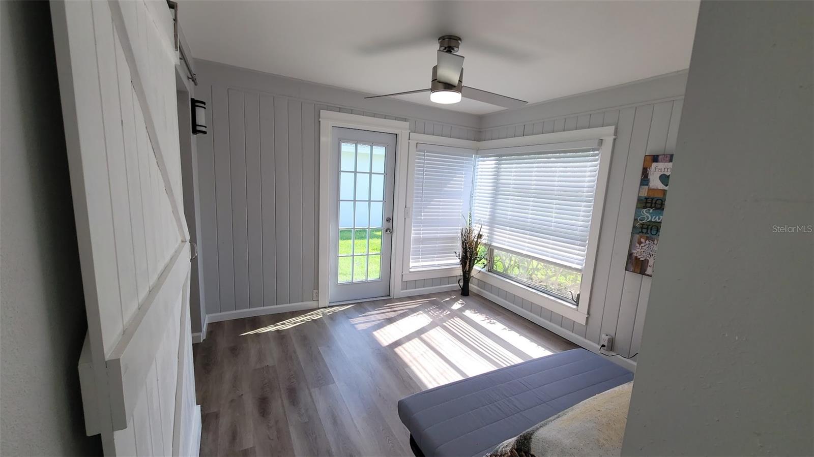 The back "multi-purpose" room could be a guest room, den, office, craft room etc. There is a "barn door" to close it off for privacy and a door that leads to the back yard.