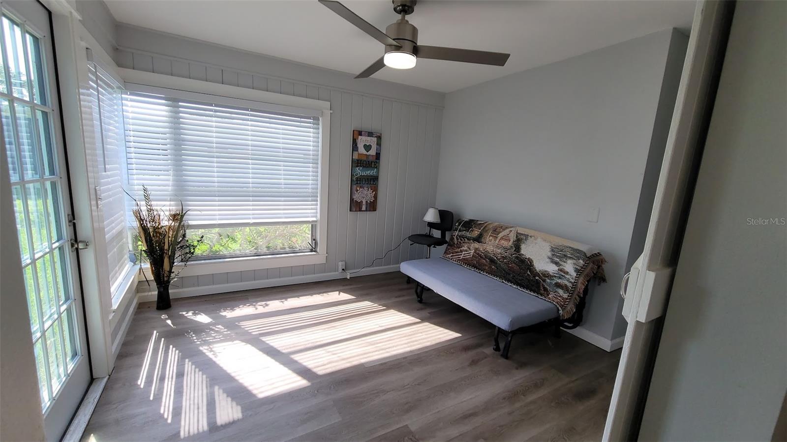 This 10X11 room offers versatility! This futon is no longer there, but offered a place to sleep for guests.