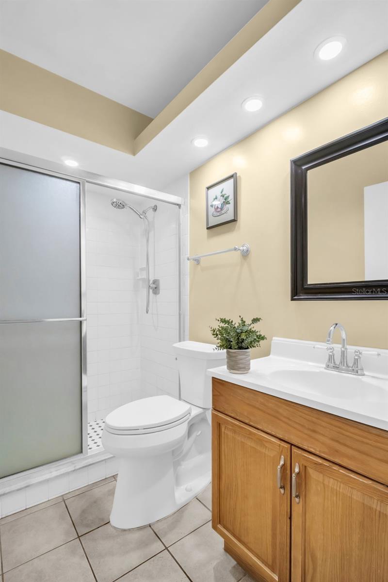 Beautifully updated en-suite bath with walk-in shower~