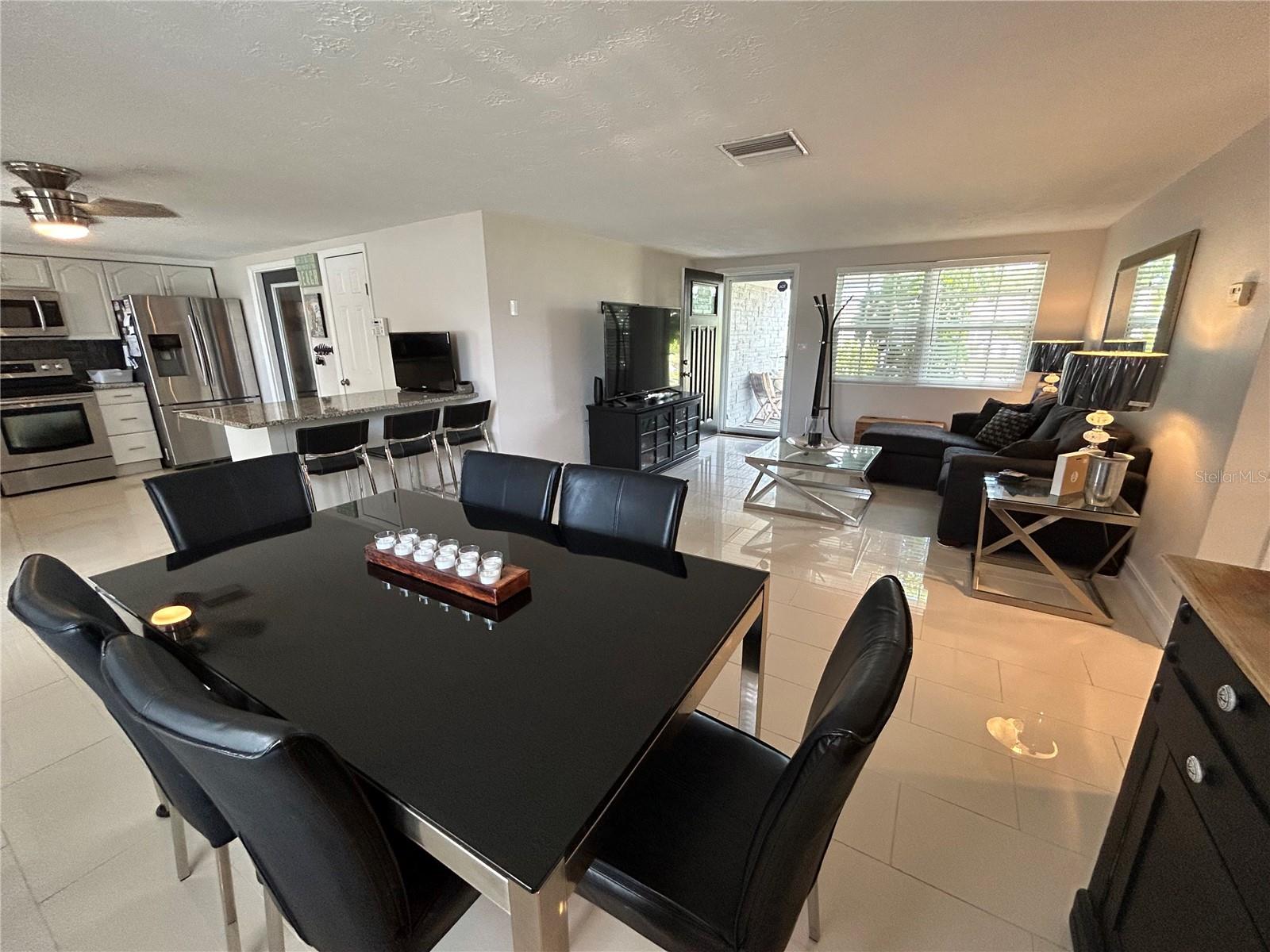Dinning room adjacent to kitchen for easy clean up and entertaining moments.