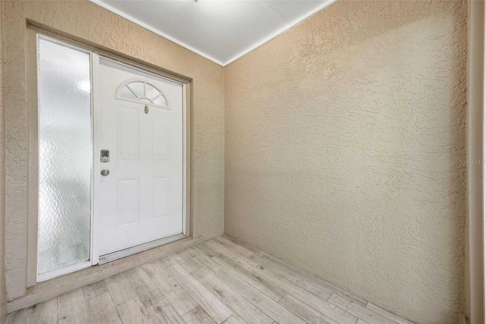 Enclosed front porch area