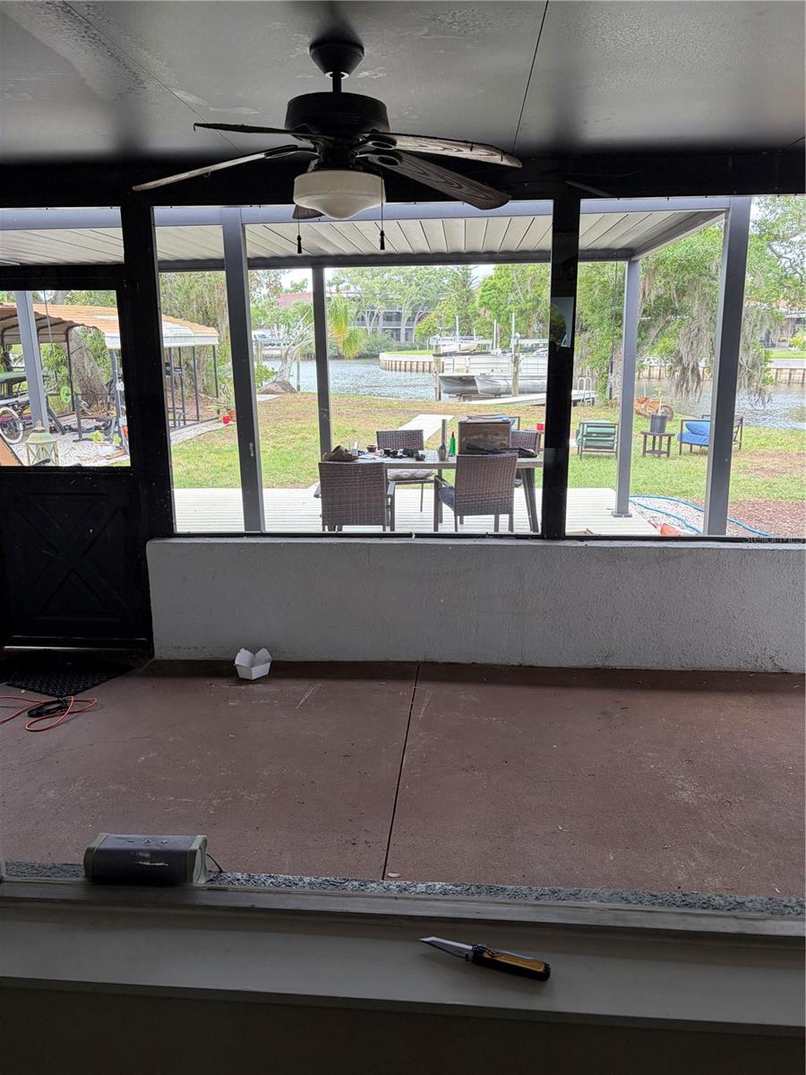 outside cement based screened in patio