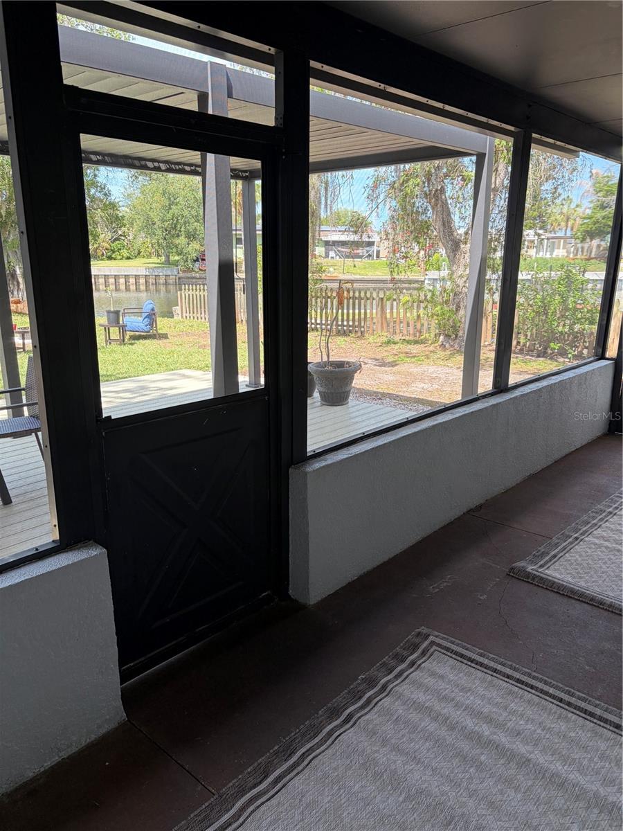 from outside screened room to deck