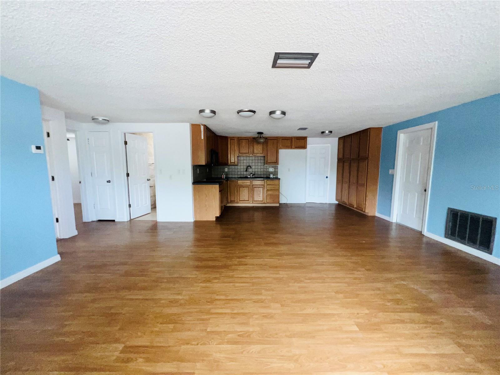 VIEW FROM FRONT DOOR OF OPEN FLOOR PLAN