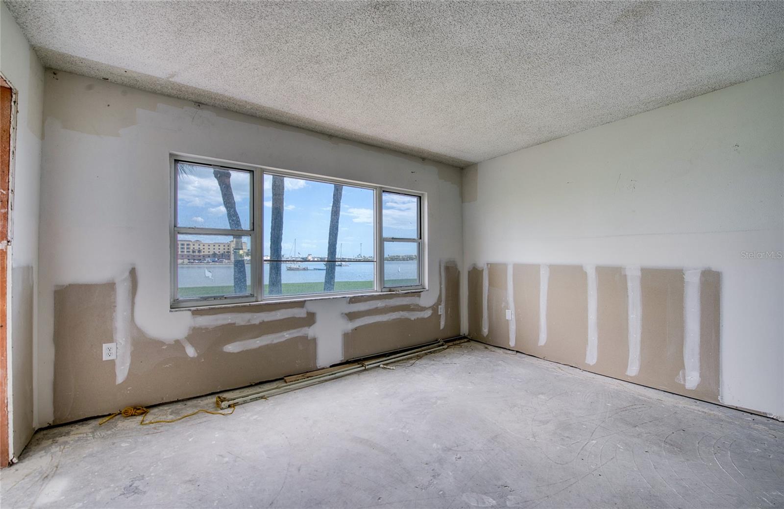 Living room looks out on Boca Ciega Bay intracoastal waterway