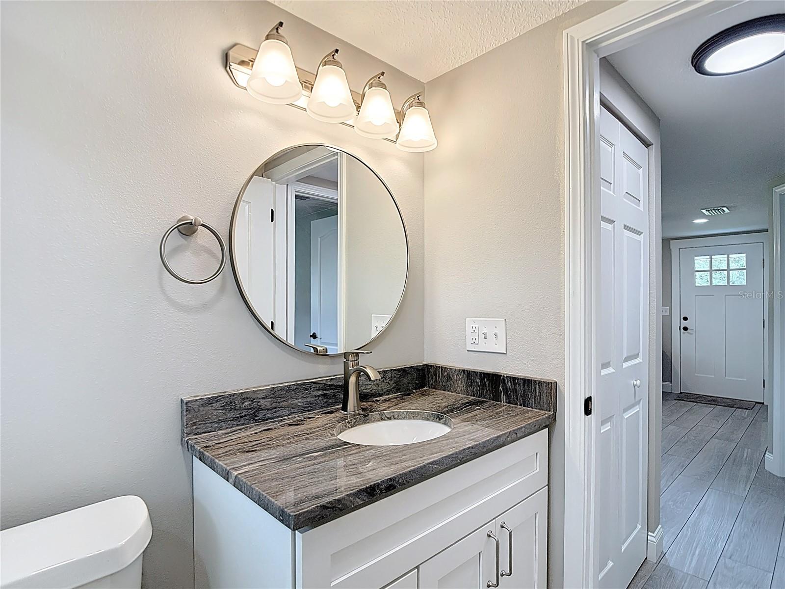Solid stone vanity top with solid wod cabinet!