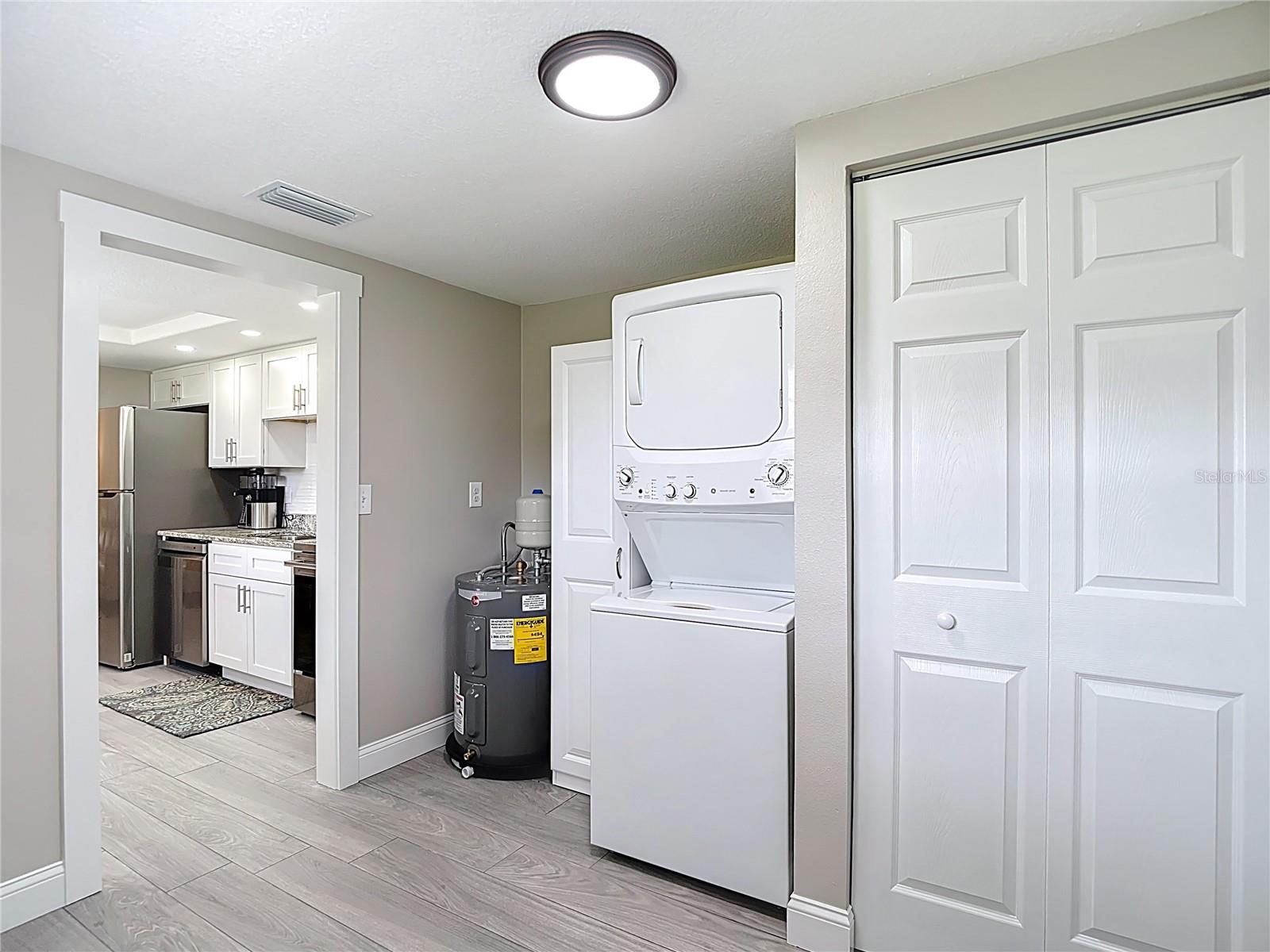 Washer and dryer located in utility room.