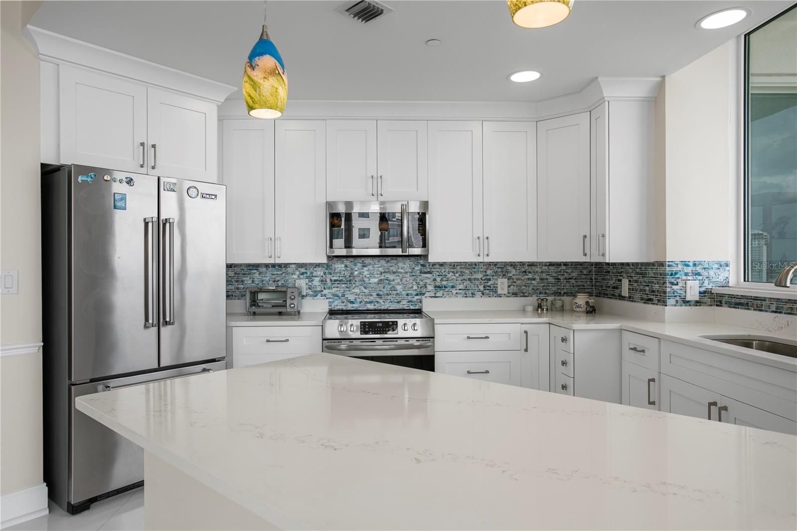 With stainless steel appliances..