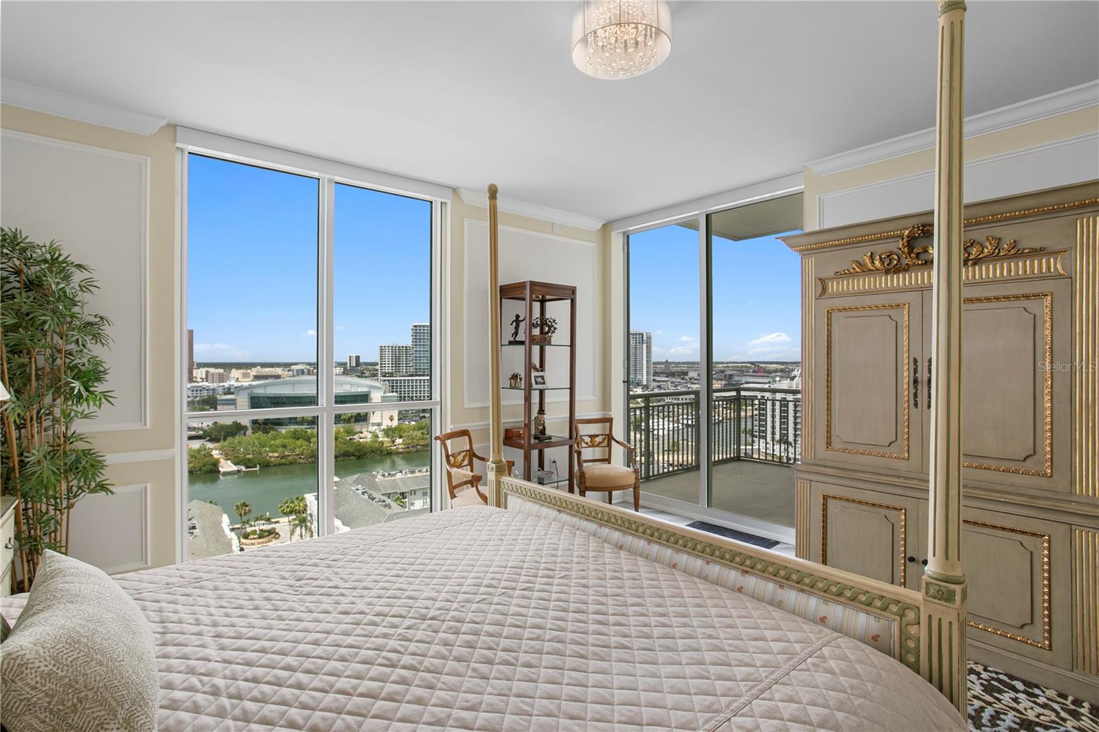 The primary bedroom has views of the city and Benchmark Arena