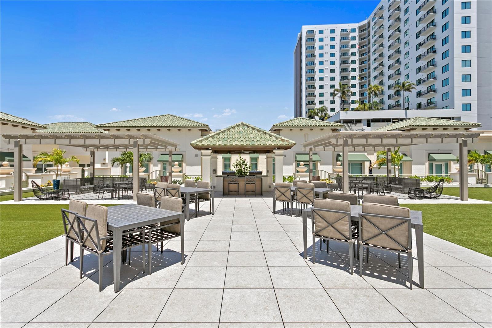 Enjoy shared cabanas and grilling areas designed for effortless outdoor living.