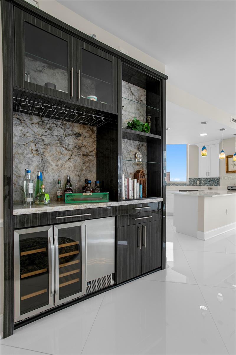 A stylish wet bar designed for effortless entertaining—your guests may never want to leave.