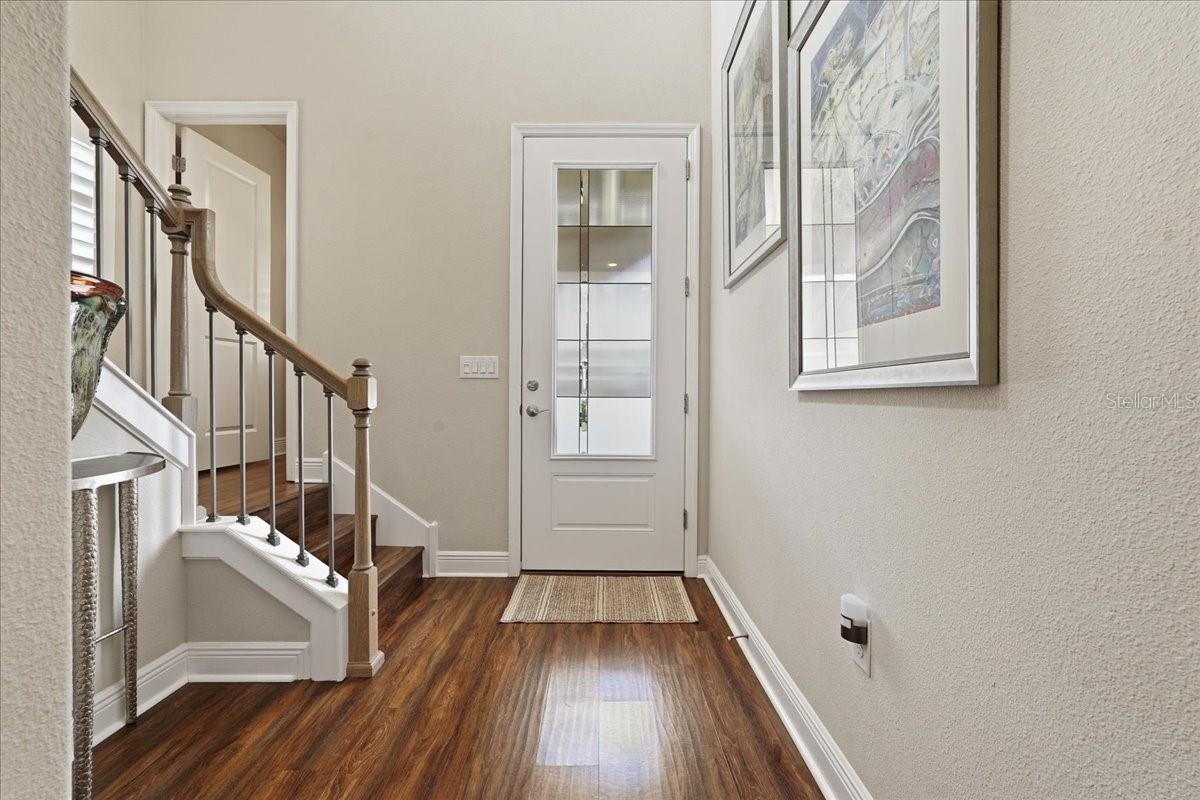 WELCOME IN! NOTICE THE CATHEDRAL CEILINGS IN THE GORGEOUS FOYER!