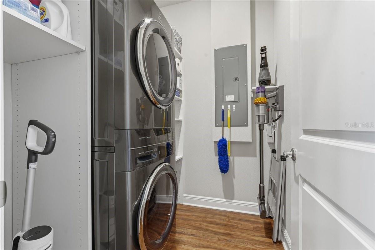 BIGGER IN PERSON ~ GREAT LAUNDRY ROOM WITH CUSTOM BUILT SHELVING FOR ORGANIZED STORAGE!