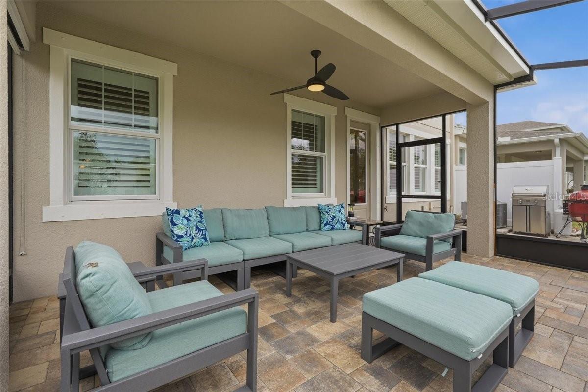 EXTENDED, SCREENED IN AND COVERED OUTDOOR LANAI & ADDITIONAL OPEN PATIO SPACE!