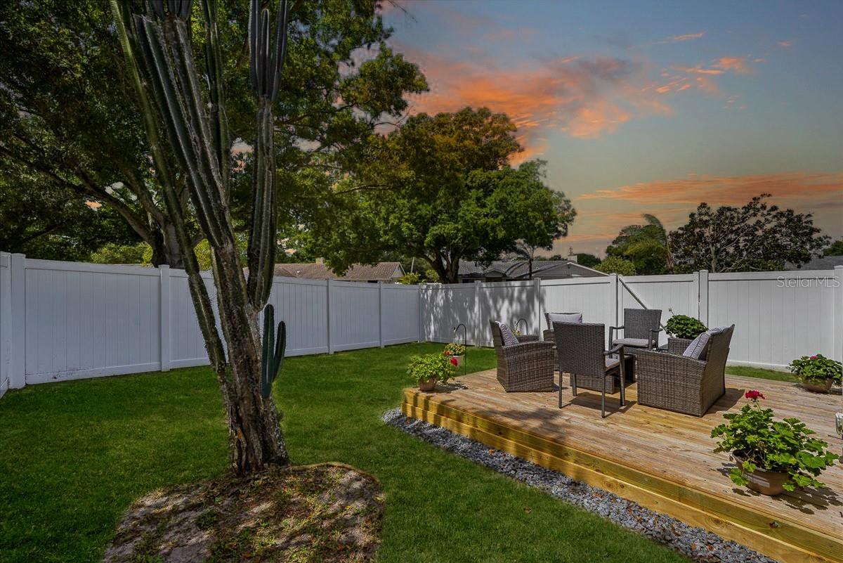 FULLY FENCED IN YARD WITH PRIVATE DECK