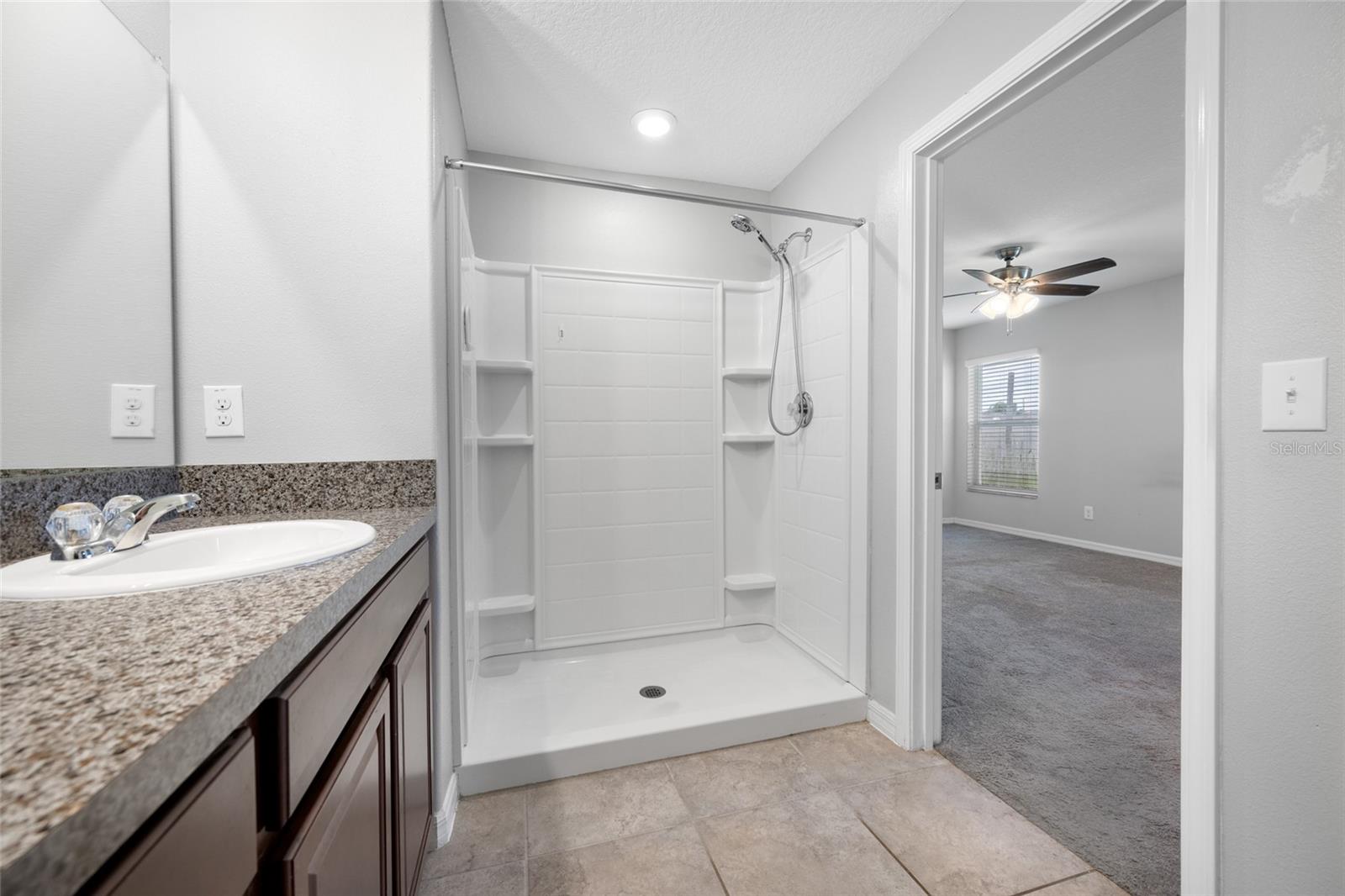 Primary Bathroom with Dual Sinks and a walk in shower