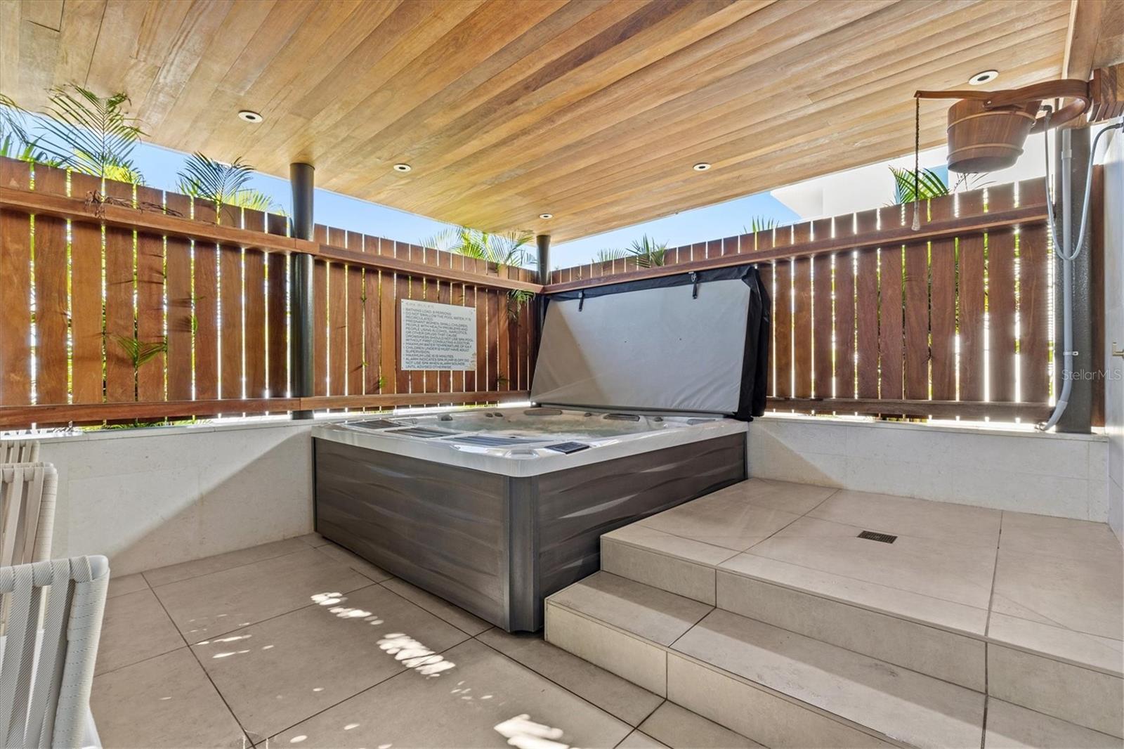 Spa Jacuzzi, Swing Chairs, and Cold Plunge Bucket