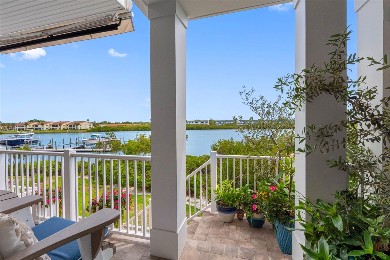 ...20 X 6 Balcony off Living Room Area - Floor Level #2... Owners Installed a Retractable Awning off Balcony. Coastal Living Florida Style .. 300 Steps to Beach Rigth across the street.Best of Both Worlds.