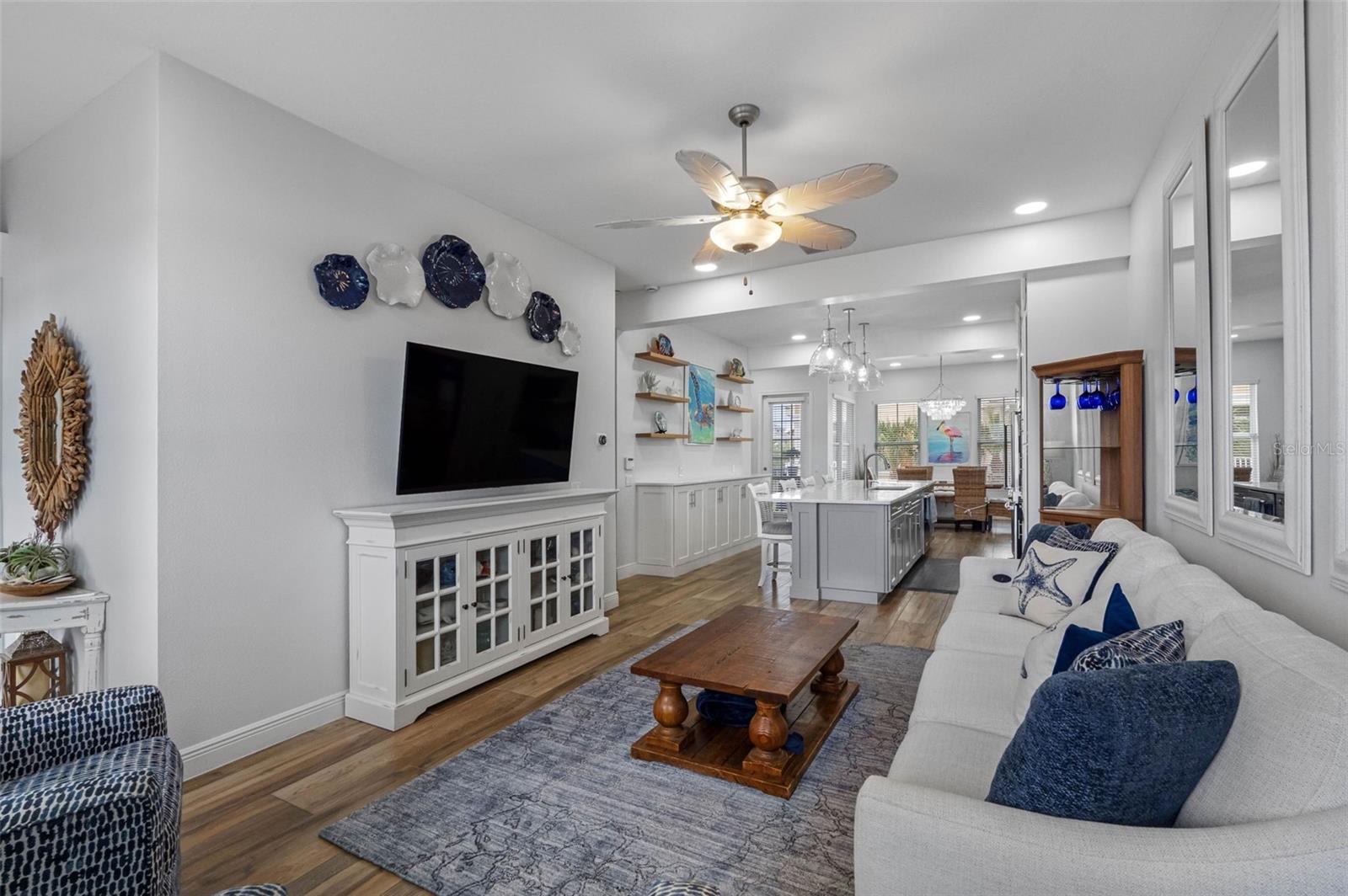 ... Living Room Shot #3... Porcelion Plank Tiling on Level 2... Levels 3 and 4 Have Wood Floors - a little softer on the Feet.