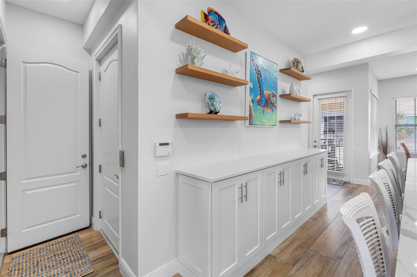 ... Elevator Lands on All 4 Floors.. Owners Added A Few  Touches a few Years ago $120,000.. Porcelain Tile Plank Flooring - New Wall Finish - Not a Detail Missed.. Just a well Thought Out  Home.