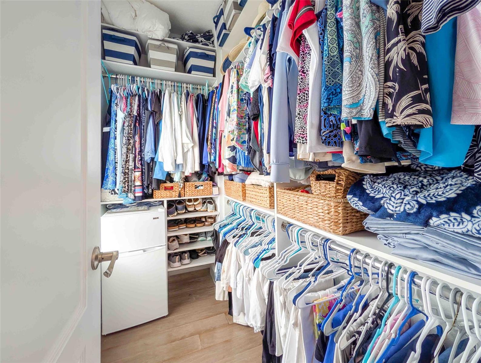 ... Master Closet.. The Owners Down a Little Remodeling and Added A Secondary Closet Space in the bathroom Area.