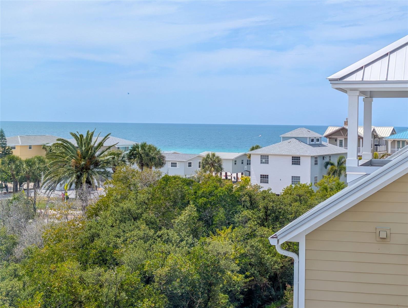 .. Slight- Slight slight views of Gulf from Upper Balcony Level 4 Office Area. The Three Other Balconies are Direct Waterfront on Intracoastal