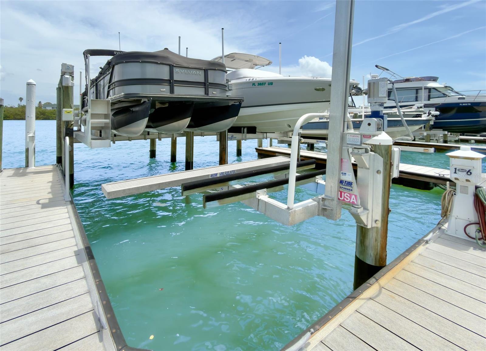 ... Boat Slip Sold Separately.. Slip can Handle a 40/50'  Craft. Jet Ski Lift Included.