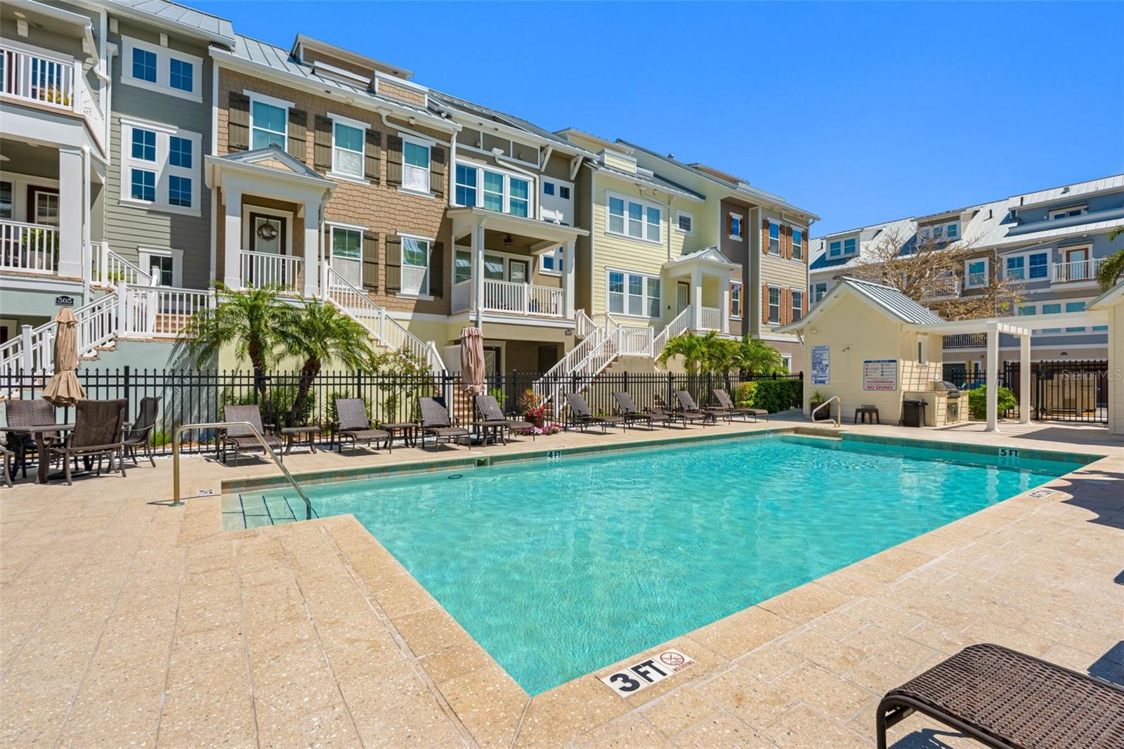 ... Plenty Of Lounging Areas By the Pool.